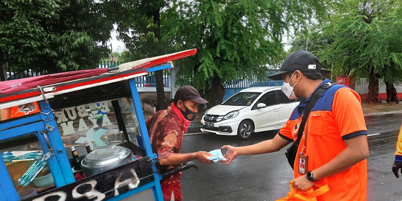 Tim BNPB Bagikan Masker Gratis di 47 Titik Ibu Kota Hari Ini